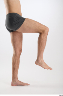 Turgen 1 flexing leg side view underwear 0003.jpg